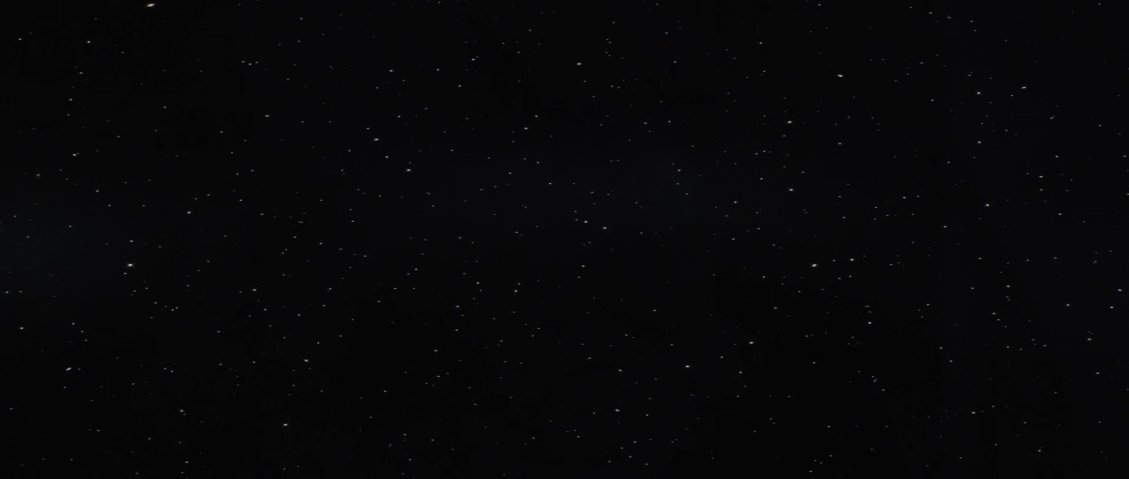 A dense field of stars against a black night sky.